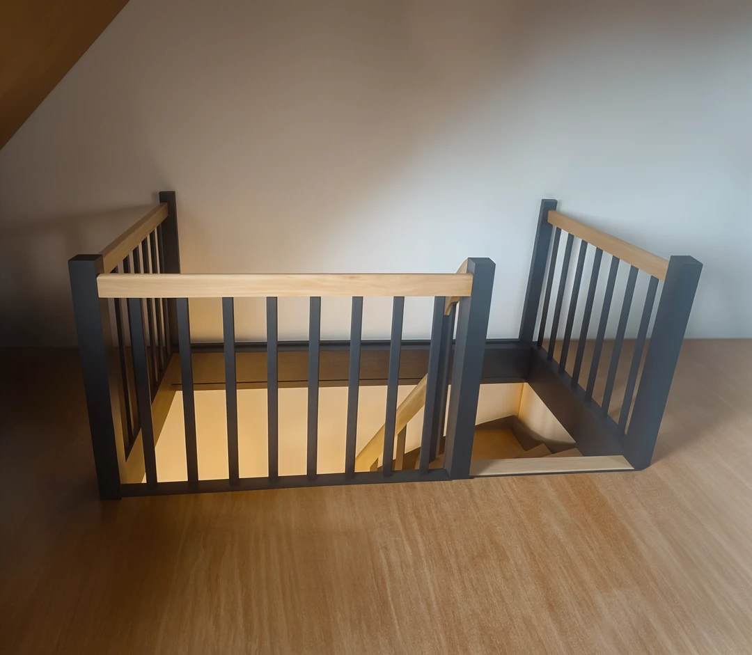 Schody policzkowe z czarnymi policzkami i prętami balustrady 1